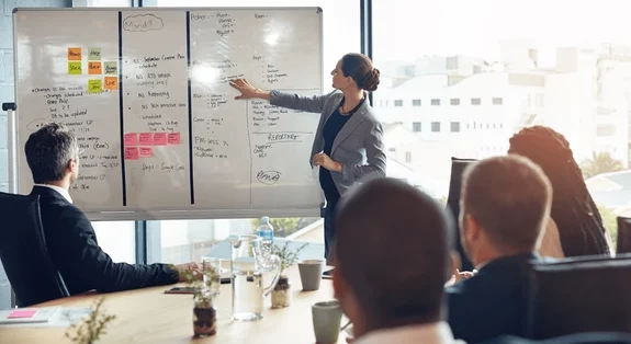Executives planning strategy with charts
